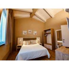 Sypialnia hotelowa Mobilspazio B&B AND SHORT STAY RENTAL