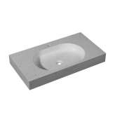 Owalna umywalka ścienna z kamienia naturalnego z wbudowanym blatem Porcelanosa Karon